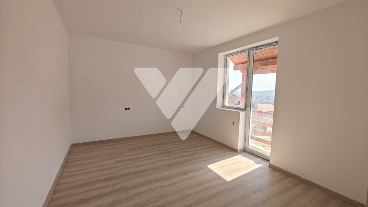 Casa tip duplex 5 camere si teren 250 mp de vanzare in Cisnadie Sibiu