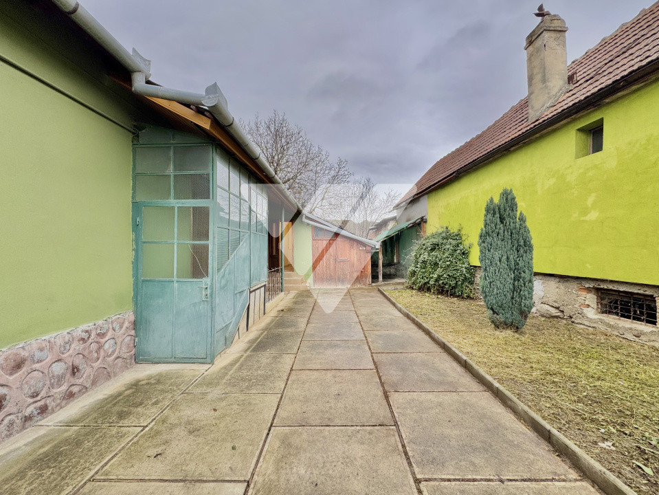 Casa individuala 2 camere 65 mp si teren 136 mp in Slimnic Sibiu