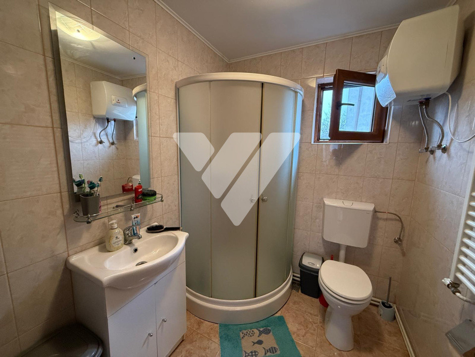 Casa individuala 4 camere 67 mp si teren 454 mp - zona Tocile 