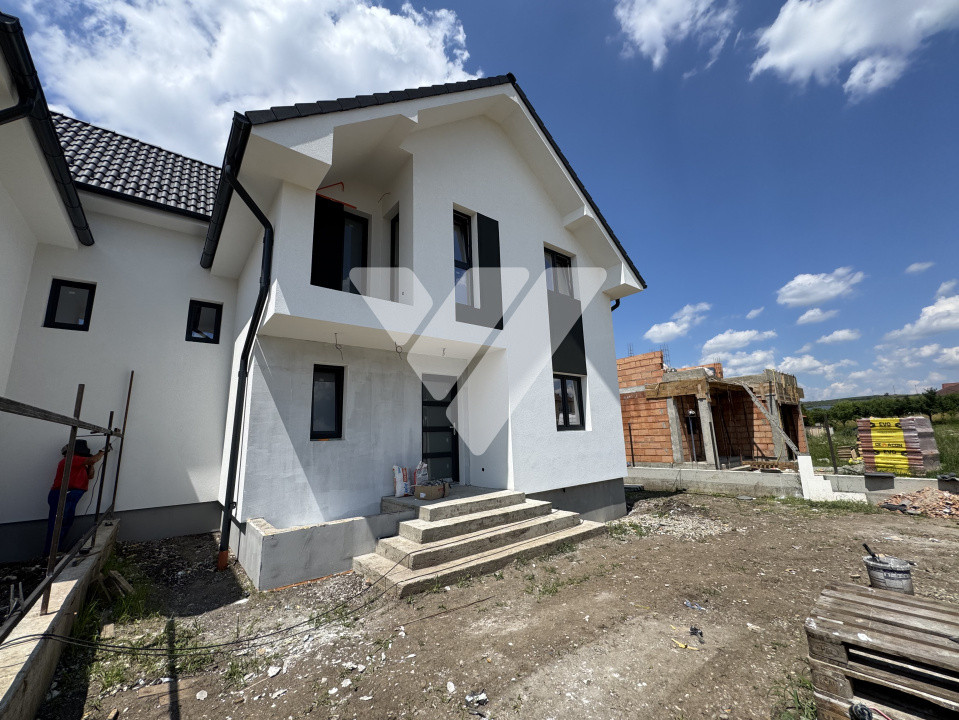 Casa noua 4 camere 3 bai 120 mp si teren 340 mp Sura Mare Sibiu