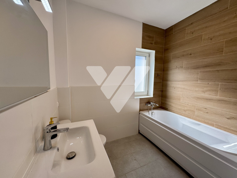 Apartament 2 camere, 2 bai si gradina la cheie Pictor Brana Selimbar