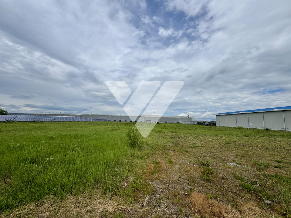Teren intravilan industrial 11.059 mp, PUZ aprobat, asfalt - zona Vest