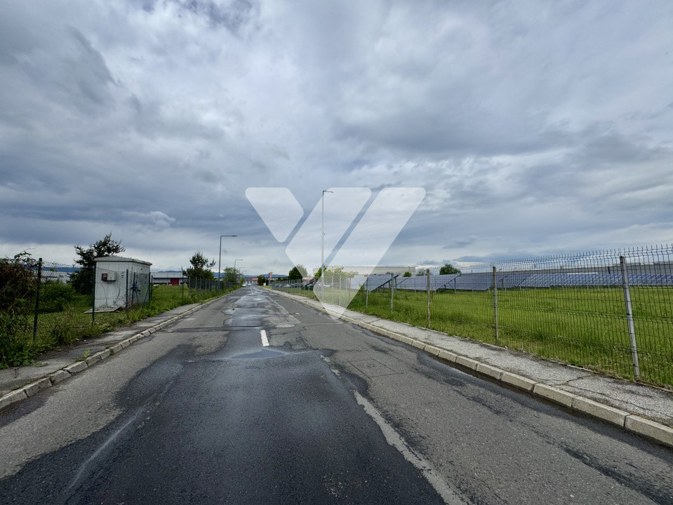 Teren intravilan industrial 11.059 mp, PUZ aprobat, asfalt - zona Vest