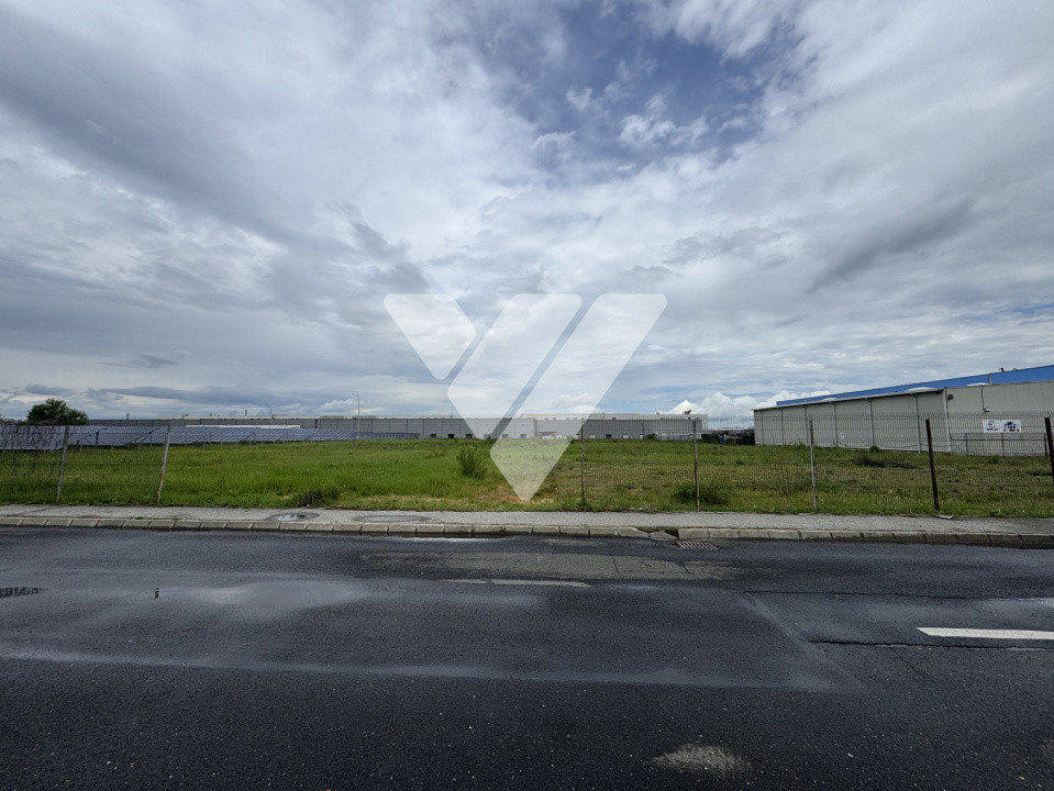 Teren intravilan industrial 11.059 mp, PUZ aprobat, asfalt - zona Vest