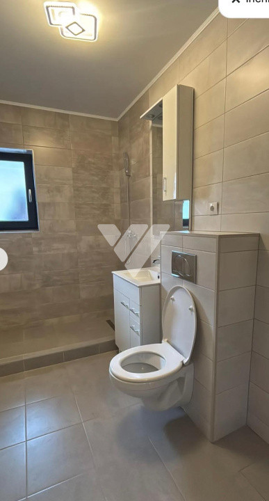 Apartament 2 camere la parter loc de parcare geam la baie