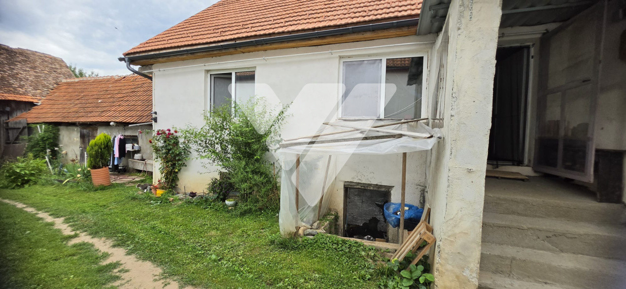 Casa individuala 3 camere teren 1317 mp de vanzare in Hosman Sibiu