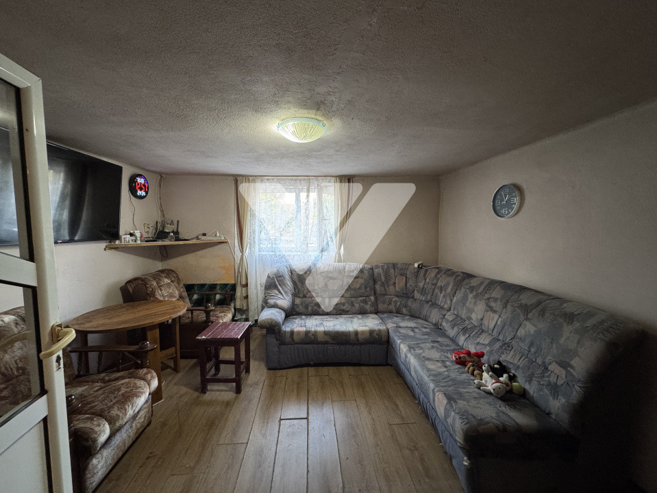 Casa individuala 5 camere cu teren 371 mp zona centrala Sadu Sibiu
