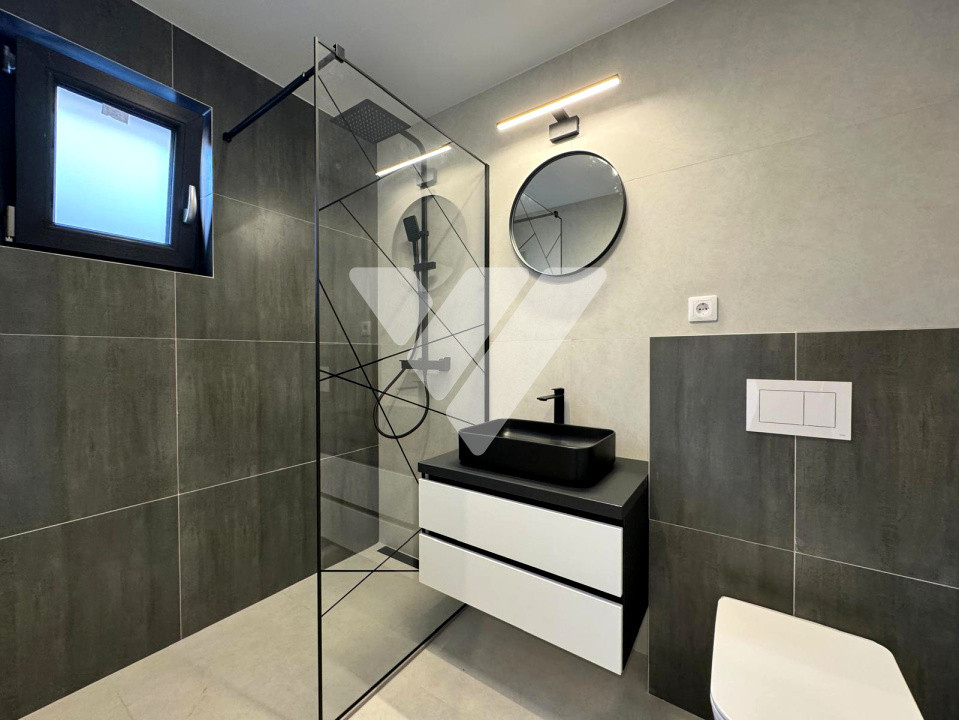 Apartament de lux 115 mp utili 4 camere 4 bai curte privata 200 mp