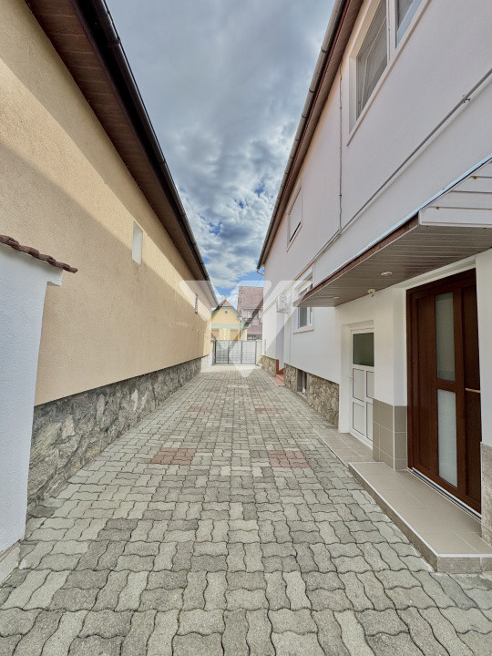 Apartament la casă – 4 camere + demisol util + curte și garaj -Sibiu
