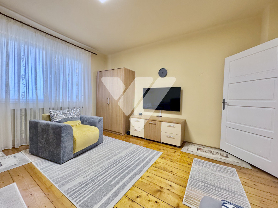 Apartament la casă – 4 camere + demisol util + curte și garaj -Sibiu
