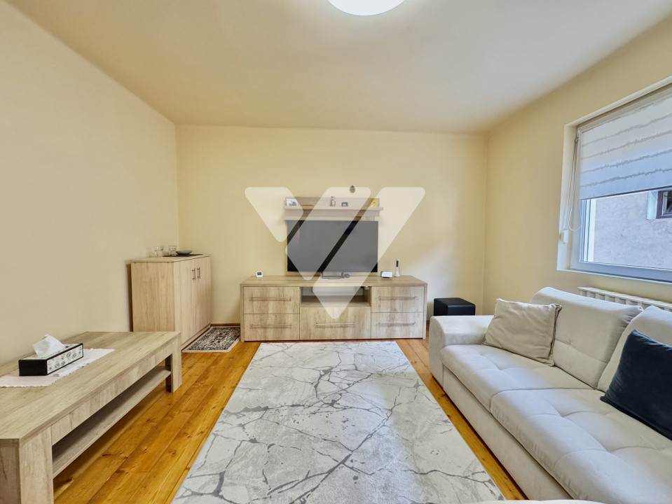 Apartament la casă – 4 camere + demisol util + curte și garaj -Sibiu
