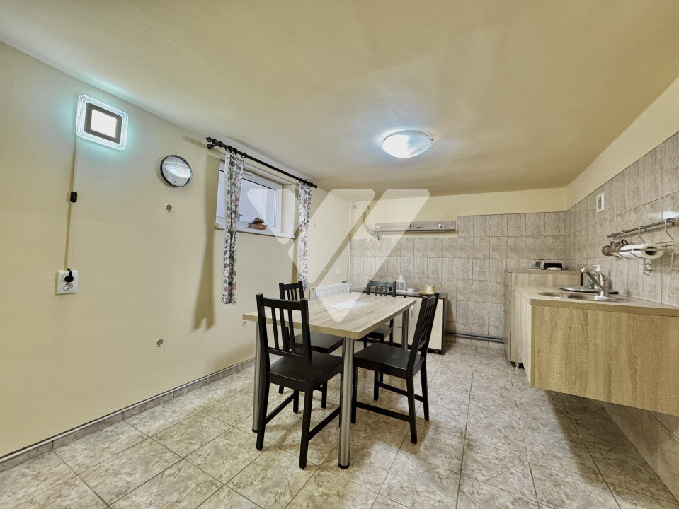 Apartament la casă – 4 camere + demisol util + curte și garaj -Sibiu